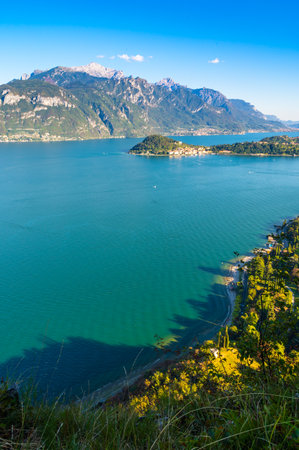 The panorama of Lake Como, photographed from the church of San Martino in Griante, showing the Northern Grigna, the Southern Grigna, the Lecco branch, the town of Bellagio, and theの写真素材