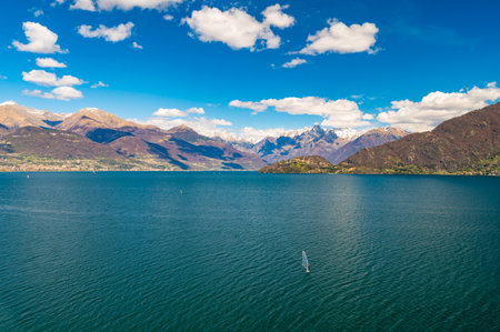 View of Lake Como, looking north, from Musso, with the Alps, the villages and the mountains of Valtellina.の写真素材