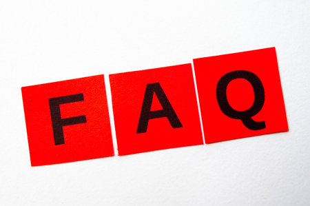 Colorful cards with FAQ, frequently asked questions written on them.の写真素材