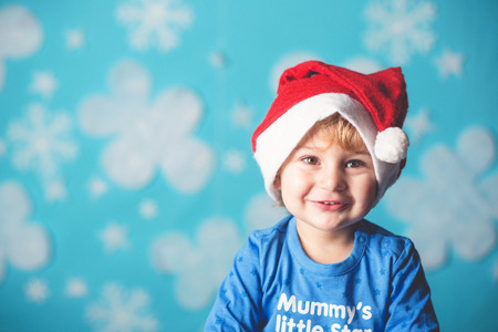 baby boy and christmas backgroundの写真素材