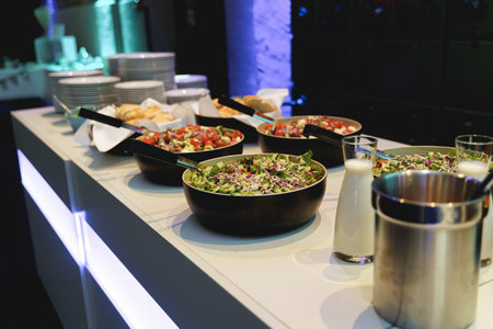 catering buffet food indoor in luxury restaurant with meat colorful fruits and vegetables