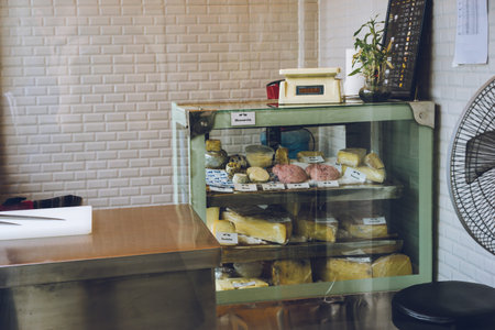 Kathmandu, Nepal - July 1, 2020: clean dairy shop with cheese, mozzarella, yak blue from organic...