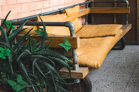 Handmade old recycled wooden and metal furniture, eco-friendly manufactory, mattress sits and...