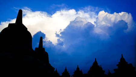 Borobudur Temple in Indonesia, epic cloudy sunset,   soft focus, film grain, travel concept, spirituality and peaceの写真素材