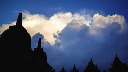 Borobudur Temple in Indonesia, epic cloudy sunset,   soft focus, film grain, travel concept, spirituality and peaceの写真素材