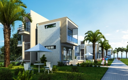 Modern building exterior with garden, palms and trees, in a summer scene  Some people are around, too の写真素材