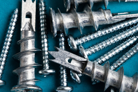 Mix of screws and drywall anchors