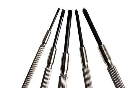 Various screw drivers on a white backgroundの写真素材