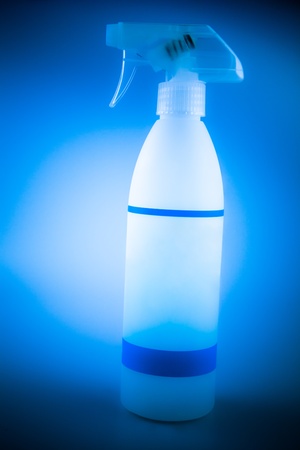 spray cleaner Bottle with a blue backgroundの写真素材