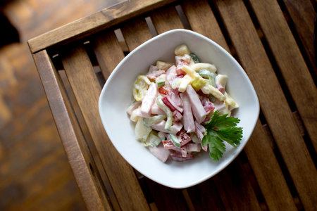 meat salad with vegetables and ham with mayonnaiseの写真素材