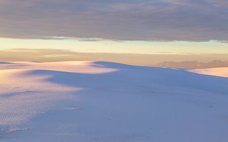 An idyllic view of White Sands National Monument in New Mexico, at sunriseの写真素材