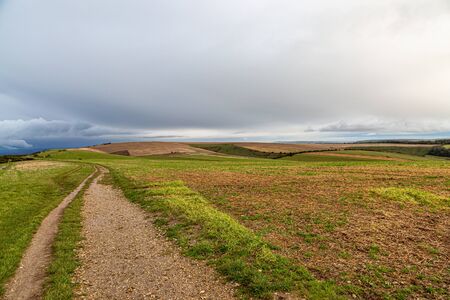 A pathway through the South Downs in Sussex on an autumnal dayの写真素材