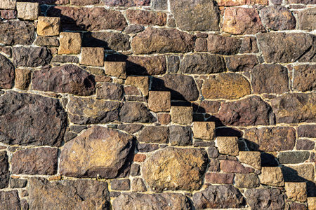 Stone steps and a sea wall, at Gorey on the island of Jerseyの写真素材