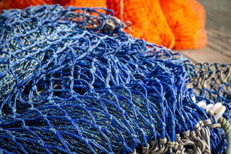 Colourful fishing nets on a jettyの写真素材