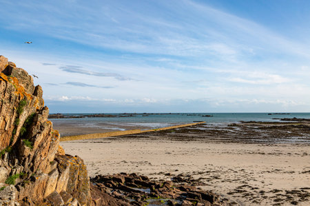A rocky coastal landscape on the island of Jersey, on a sunny summers day