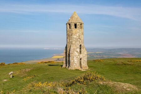 The medieval tower of St Catherine's Oratory on the Isle of Wight, on a sunny spring morningの写真素材