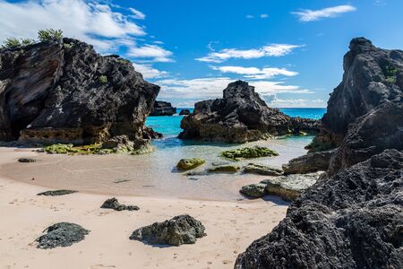 Rock formations at Horseshoe Bay, on the island of Bermuda, on a sunny dayの写真素材