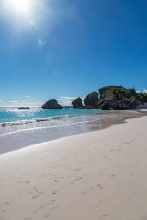 The sandy beach and turquoise sea, at Horseshoe Bay, Bermudaの写真素材