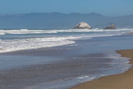 Looking along Ocean Beach in San Francisco towards Seal Rocksの写真素材