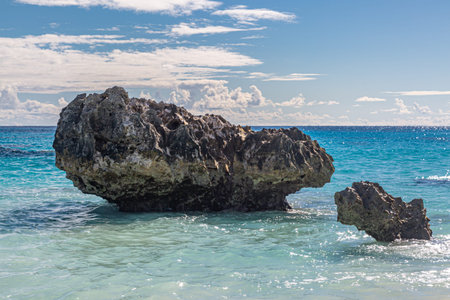 Large rocks in the turquoise ocean, at Horseshoe Bay on the Island of Bermuda