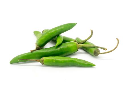 Green finger chillies against a white backgroundの写真素材