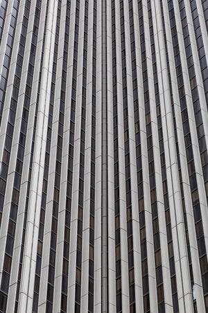A full frame abstract photograph of the exterior of a skyscraper