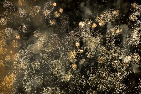 Fireworks exploding against a night sky, at Lewes Bonfire celebrationsの写真素材