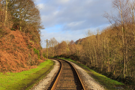 A winter landscape of a  railway line in rural Cumbriaの写真素材