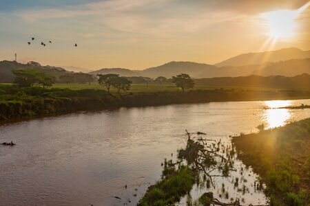 Sunrise over the Tarcoles River in Costa Ricaの写真素材