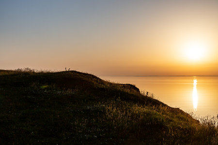 Sunset over Rhossili Bay on the Gower Peninsulaの写真素材