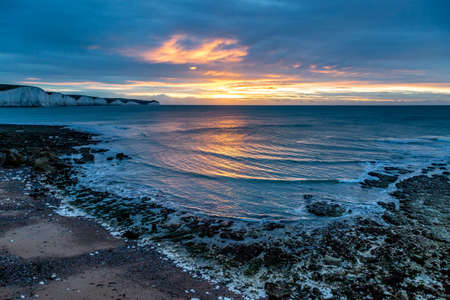 Sunrise at the Seven Sisters Cliffs in Sussex, Viewed from Hope Gapの写真素材