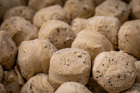 An abundance of suet balls for a bird feederの写真素材