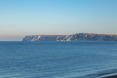 Looking out over the ocean towards the chalk cliffs near Freshwater Bay, from Brook Chine on the...