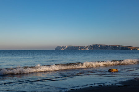 Looking over the sea towards Freshwater Bay, on a sunny morning on the Isle of Wightの写真素材