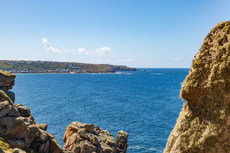 Looking out towards Sennen Cove from the South West Coast Path, on a sunny summer's day