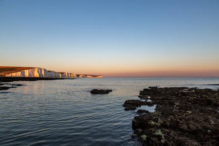 An idyllic sunset view of the Seven Sisters Cliffs in East Sussexの写真素材