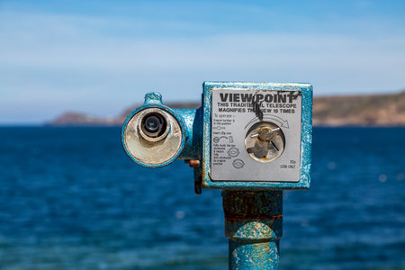 A traditional seaside telescope at Sennen Cove on the Cornish coastの写真素材