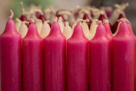 A display of olourful candles for saleの写真素材