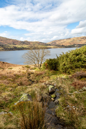 Looking out over Ullswater in Cumbria, on a sunny April dayの写真素材