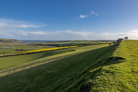 Looking out over the Cuckmere Valley towards the Sussex coast, on a sunny spring evening