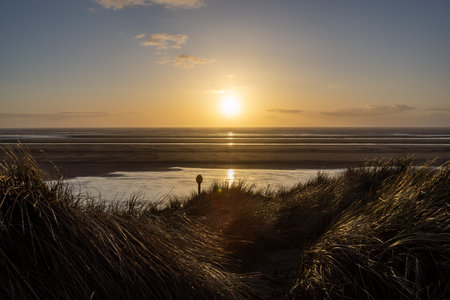 Sunset over the ocean, on the Merseyside coast