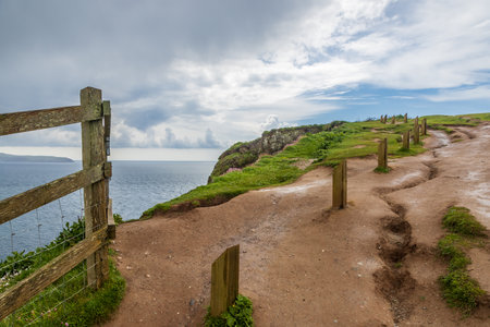 A pathway alongside a clifftop, at Burgh Island off the Devon coastの写真素材