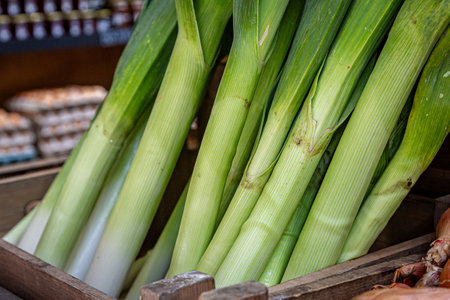 Leeks for sale on a farmer's market stall, with selective focusの写真素材