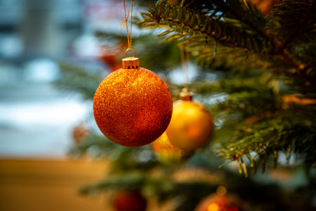 Colourful baubles on a Christmas tree, with a shallow depth of fieldの写真素材