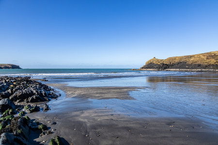 Abereiddy beach on the Pembrokeshire coast, with a clear blue sky overheadの写真素材