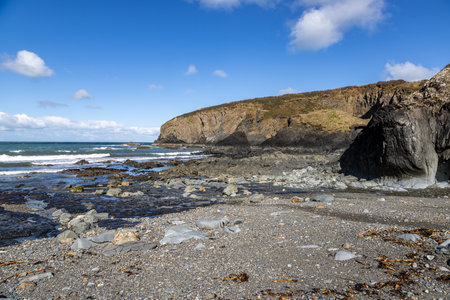 A view over the rugged beach near the ruins of Melin Trefin Mill, on the Pembrokeshire coastの写真素材