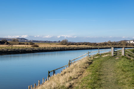 The River Ouse in the South Downs near Lewes on a sunny early spring dayの写真素材