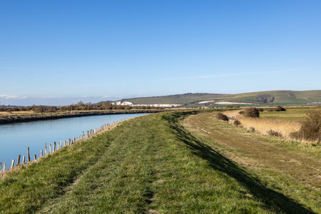 A view of the River Ouse towards Lewes, on a sunny early spring day in the South Downsの写真素材