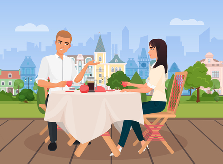 Vector illustration of young man and woman communicating sitting in outside cafe on the old city background.のイラスト素材