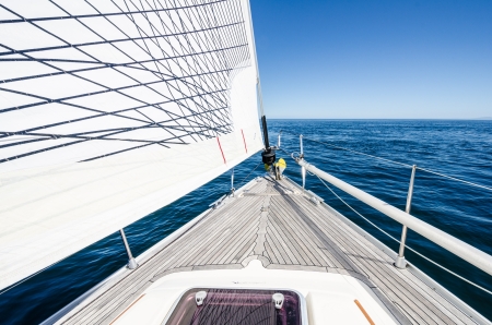 Bow of sailboat at sea on a clear sunny dayの写真素材